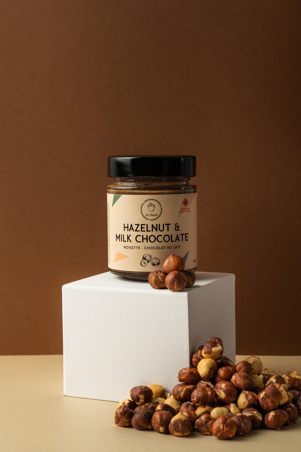 Aupralin hazelnut milk chocolate spread on a box with hazelnut